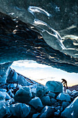 Glacial Ice Cave, Svinafellsjokull glacier, Skaftafell National Park, Iceland. Model Released.