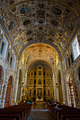 The ornate interior of the Baroque ecclesiastical Church of Santo Domingo de Guzman in the city of Oaxaca de Juarez, Oaxaca, Mexico.