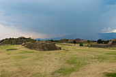 View of the Grand Plaza from the North Platform of Monte Alban (UNESCO World Heritage Site), which is a large pre-Columbian archaeological site in the Valley of Oaxaca region, Oaxaca, Mexico.