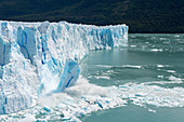 Sequence of a huge chunk of ice calving from the glacier face of the Perito Moreno Glacier in Los Glaciares National Park near El Calafate, Argentina.