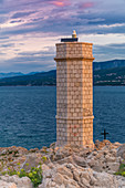 Sunrise at Silo lighthouse, Punta Silo (šilo), Kvarner bay, Krk island, Croatia