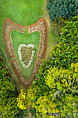 Heart shape in the ornamental gardens of Eureka La Maison Creole, colonial house, aerial view, Moka, Indian Ocean, Mauritius