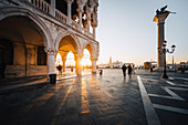 Sunrise in San Marco Square, with San Giorgio Church on the background. Venice, Veneto, Italy.