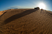 Tent and  SUV in desert, Erg Awbari, Sahara desert, Fezzan, Libya.