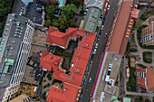 Birds eye view of a Malmo street and buildings with red roofs.