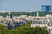 France, Paris, the column of the genius of the Bastille and the Mercurial Towers