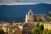 France, Vaucluse, regional natural reserve of Luberon, Saignon, the village, the church Notre Dame of Pity or Saint Marie de Saignon of the XIIe century