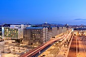 France, Bouches du Rhone, Marseille, Euromediterranee zone, La Joliette district, Henri Verneuil square, Euromediterranee boulevard, Les Docks, A55 motorway and the Joliette tunnel entrance from the Silo Lady of the Guard in background