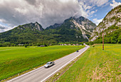 View of road leading into mountains, Unterburg, Styria, Tyrol, Austrian Alps, Austria, Europe