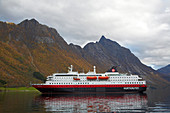 Hurtigruten in the Hjoerundfjorden near Urke, Nahe Alesund, Moere og Romsdal, Norway, Europe