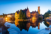 The beautiful buildings of Bruges reflected in the still waters of the canal, UNESCO World Heritage Site, Bruges, Belgium, Europe