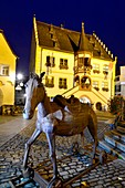 at the market square with parish church in Volkach am Main, Lower Franconia, Bavaria, Germany