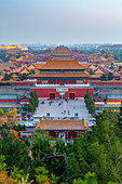 View of the Forbidden City, UNESCO World Heritage Site, from Jingshan Park at sunset, Xicheng, Beijing, People's Republic of China, Asia
