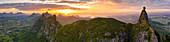 Aerial panoramic of sunset over Le Pouce and Pieter Both mountains, Moka Range, Port Louis, Mauritius, Africa