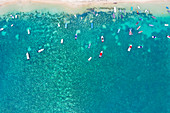 Aerial by drone of boats in the turquoise water of lagoon front of Mont Choisy beach, north-west coast, Mauritius, Indian Ocean, Africa