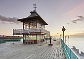 A Victorian pavilion on the restored Clevedon Pier, seen at dusk, Clevedon, North Somerset, England, United Kingdom, Europe