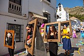 Traditional carnival parade at the white village of Mijas. Malaga province Costa del Sol. Andalusia, Southern Spain Europe