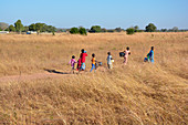 Gambia; Central River Region; Kuntaur; Children on a dirt road; on the way to the stone circles of Wassu