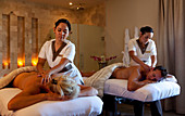 A couples massage in natural light. Algarve, Portugal.