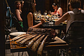 Expertly grilled prime rib is served during a barbecue evening in a Residence Villa accommodation at Six Senses Fiji Resort, Malolo Island, Mamanuca Group, Fiji Islands, South Pacific