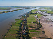 Aerial view of Tonle Sap River, village and rice fields, Kampong Prasat, Kampong Chhnang, Cambodia, Asia