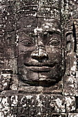Riesige Gesichter in Stein gemeißelt am Bayon Tempel, Angkor Wat, nahe Siem Reap, Siem Reap Province, Kambodscha, Asien