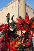 Masks at the Venice Carnival in St. Mark's Square, Venice, Veneto, Italy, Europe
