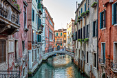 Small, white bridge over the &quot;Rio de la Barcaroli&quot; for pedestrians, Venice, Veneto, Italy