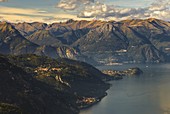 Mountains frame lake Como, Bellagio, Oliveto Lario and Civenna village, a view from Sev refuge, Valbrona, Corni di Canzo, Como and Lecco province, Lombardy, Italy, Europe
