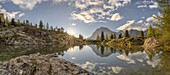 the Lagazuoi mountain is reflected in the clear waters of Lake Limides in a summer sunset, Dolomites, municipality of Cortina d'Ampezzo, Belluno province, Veneto district, Italy, Europe