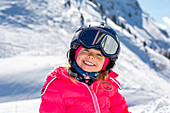Child having fun in the snow in St. Johann in Tirol, St. Johann, Tirol, Austria