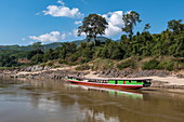 Boat for long-distance passenger transport on Mekong River, Pak Tha District, Bokeo Province, Laos, Asia