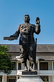Statue of King Sisavang Vong in the royal palace grounds, Luang Prabang, Luang Prabang Province, Laos, Asia