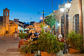 People eating at a restaurant outdoors at night in Latchi, Cyprus, Mediterranean, Europe