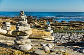 France, Pyrenees Atlantique, Pays Basque, Urrugne, Cairn at the foot of the Flysch cliffs of the Bask Corniche