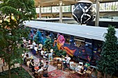 France, Paris, National Library of France (BNF) district, Restaurant La Felicita, of Big Mama, mega restaurant of 4500 m2 in the heart of Station F, the gigantic incubator of start ups, Historic train wagons adorned with street art