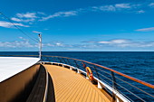 Deck at the bow of the expedition cruise ship World Explorer (Nicko Cruises) in the South Atlantic, near Brazil, South America