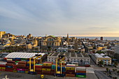 Aerial view of freight containers on pier with city skyline at sunrise, Montevideo, Montevideo Department, Uruguay, South America