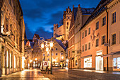 Reichenstrasse in the old town of Füssen with a view of Hohes Schloss, Allgäu, Bavaria, Germany