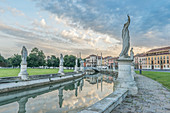 The Prato della Valle town square with sculptures and a canal, Veneto, Italy.