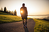 Runner enjoys the sunrise in the morning hours, running, sports, allg? U