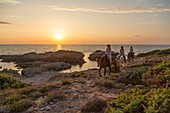 France, Haute Corse, Nebbio, Agriates desert, Anse de Peraiola, riders east of Ostriconi beach