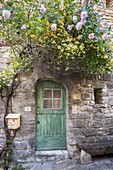 France, Vaucluse, regional natural reserve of Luberon, Saignon, door of village house