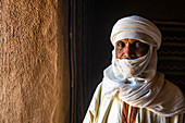Guardian standing in the Interior of the French Fort in the Oasis of Timia, Air Mountains, Niger, Africa