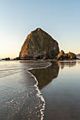 Haystack Rock with low tide, Cannon Beach, Clatsop county, Oregon, United States of America, North America
