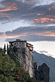 Clouds at sunset over Roussanou (St. Barbara) Monastery, Meteora, UNESCO World Heritage Site, Thessaly, Greece, Europe