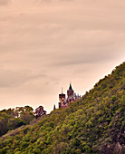 View over the Siebengebirge to Drachenburg Castle, Koenigswinter, North Rhine-Westphalia, Germany