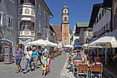 Obermarkt with a view of the Church of St. Peter and Paul, Mittenwald, Upper Bavaria, Bavaria, Germany