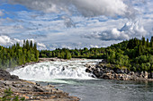 The river Vefsna with the waterfall Laksfossen, Norway