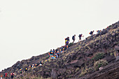 People trekking to the top of Stromboli volcano, Stromboli, Aeolian Islands, Sicily, Italy